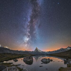 Alpine Reflections: Lake Stellisee’s Starry Nights