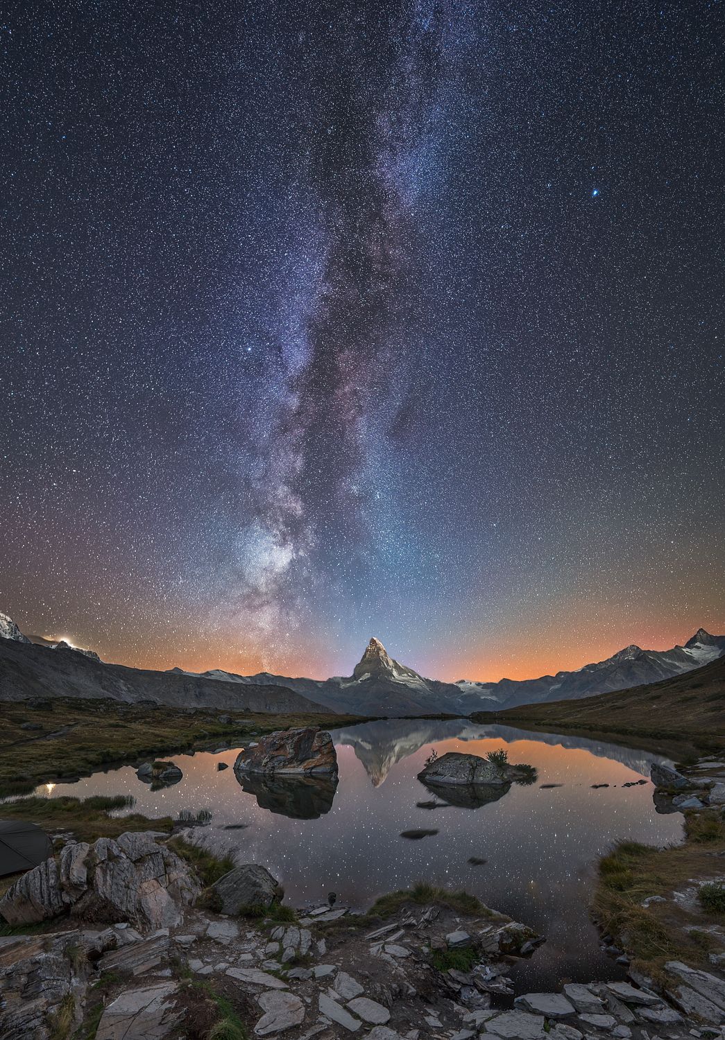 Alpine Reflections: Lake Stellisee’s Starry Nights